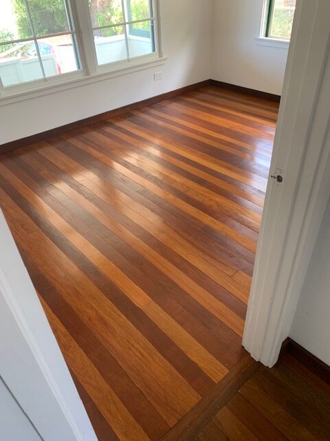 Bedroom With Wooden Floor
